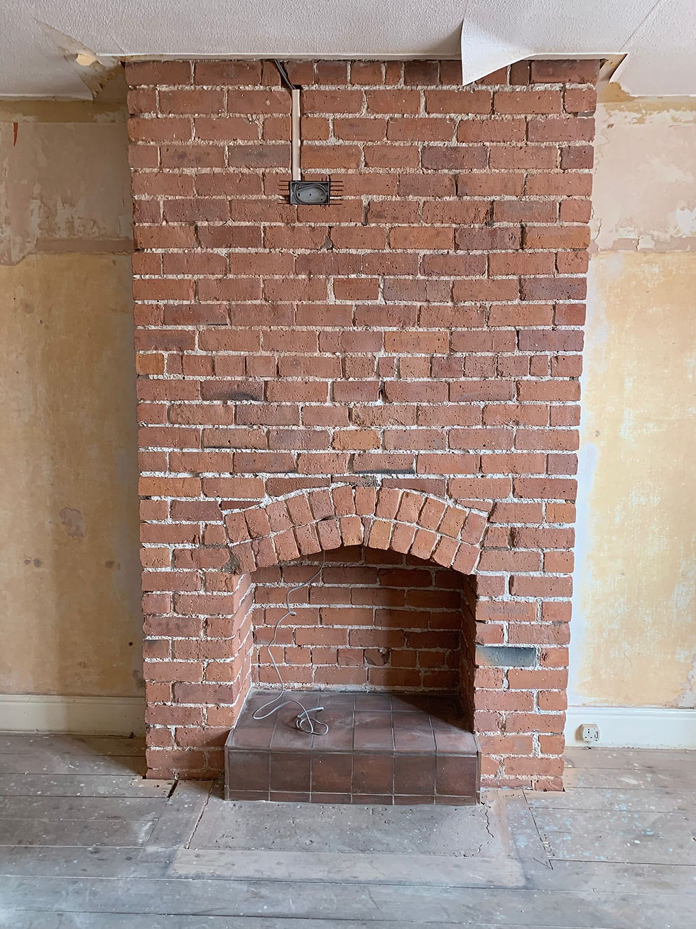 Fireplace Paint Removal in Rhyl, North Wales – Before & After Transformation