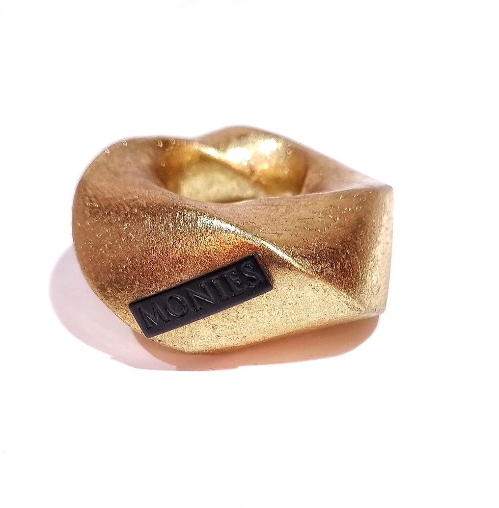 Monies ring in ebony and gold leaf