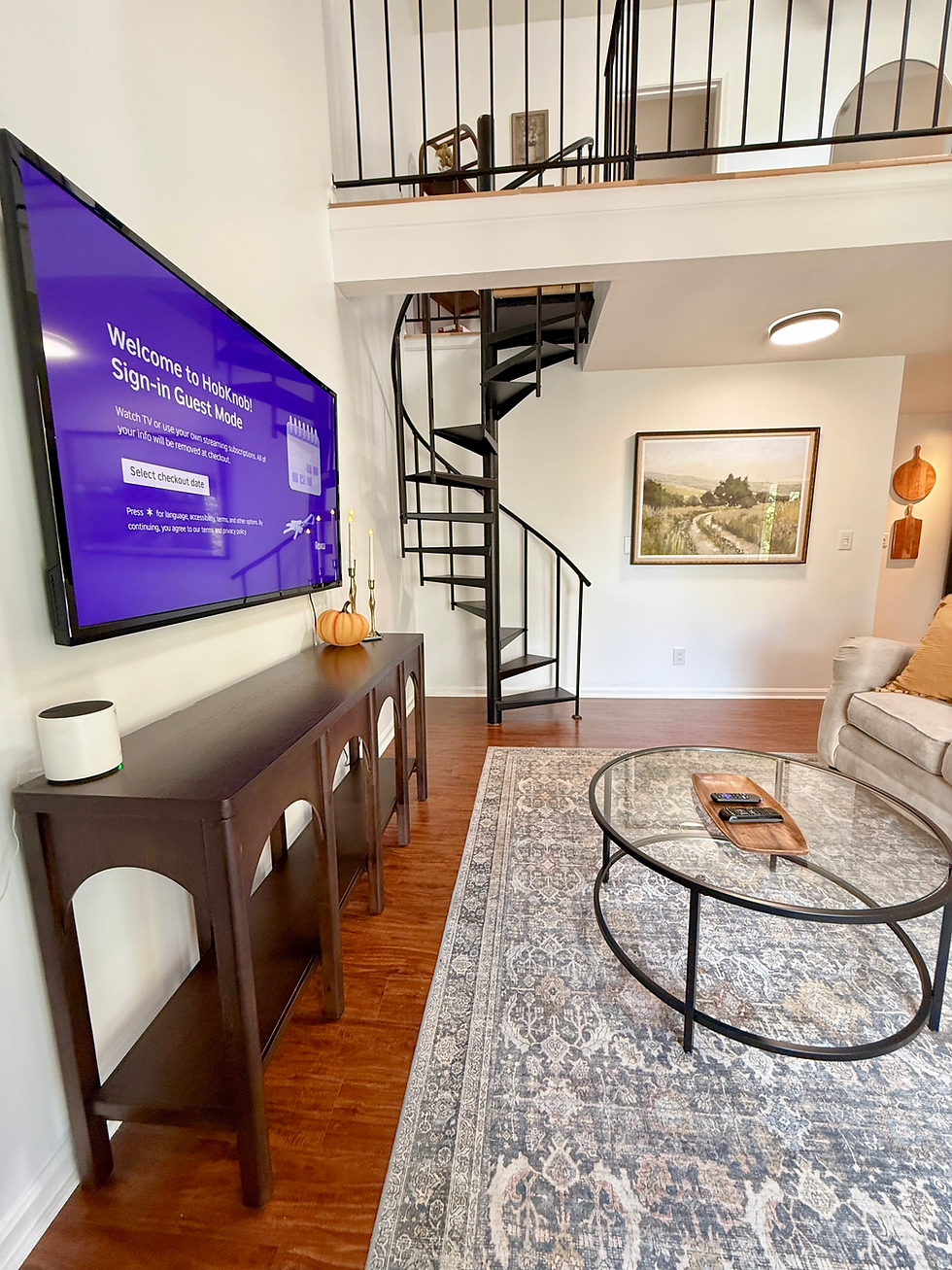 Fully furnished living area in a HobKnob mid-term rental in Louisville, KY