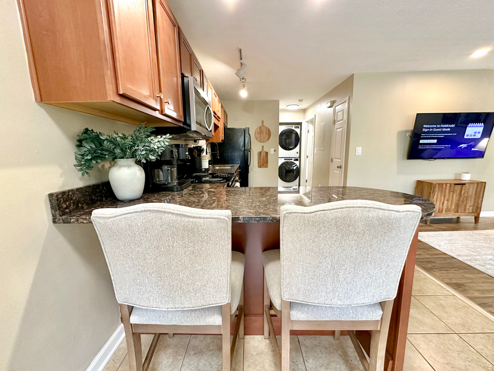 Furnished living space in a HobKnob corporate relocation housing home in Louisville, KY, used for employee relocation and mid-term assignments.