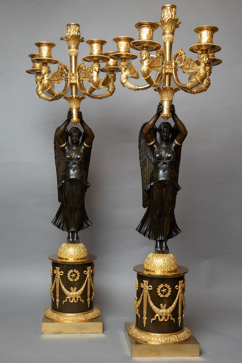 Paire de candélabrccandélabres en bronze doré et patiné – Signés RABIAT – Époque Empire