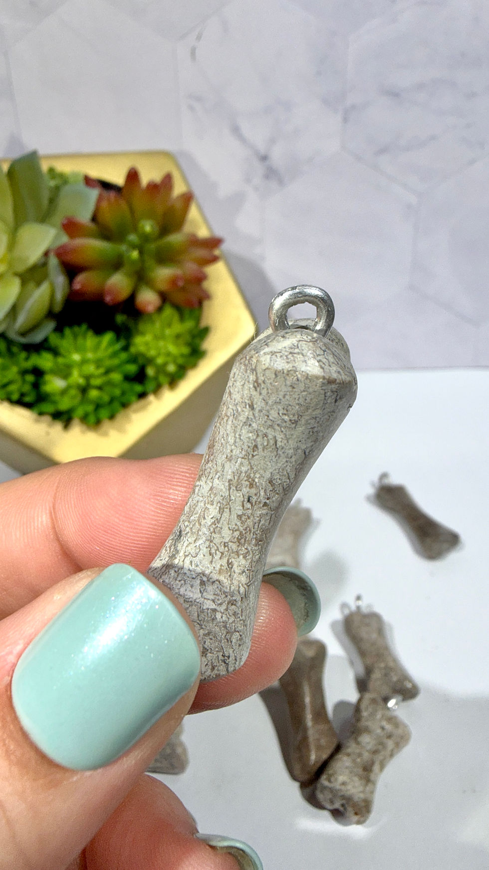 Thumbnail: Genuine Dinosaur Bone Pendant "Atlasaurus imelakai"