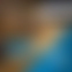 The Superannuation Audit Services Team Sitting Around a Boardroom Table Looking at a Laptop