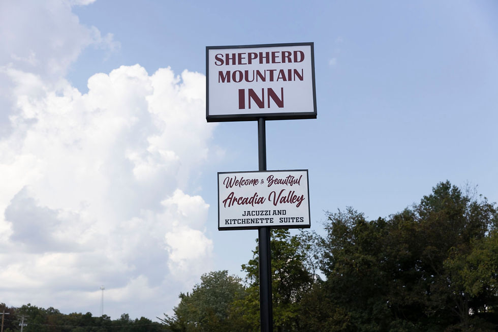 Shepherd Mountain Inn & Welcome to Beautiful Arcadia Valley sign