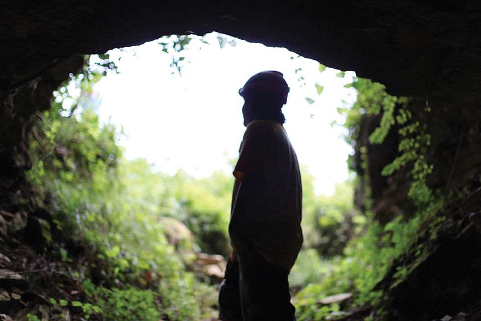 Man in entrance at Berome Moore Cave. Missouri Cave. #573Magazine