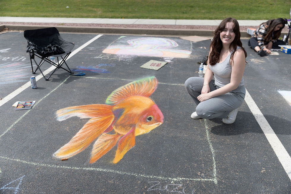 ZuZu Smugala pictured with the winning Chalk drawing at the 573 Chalk Art Festival in Marquand, Missouri.