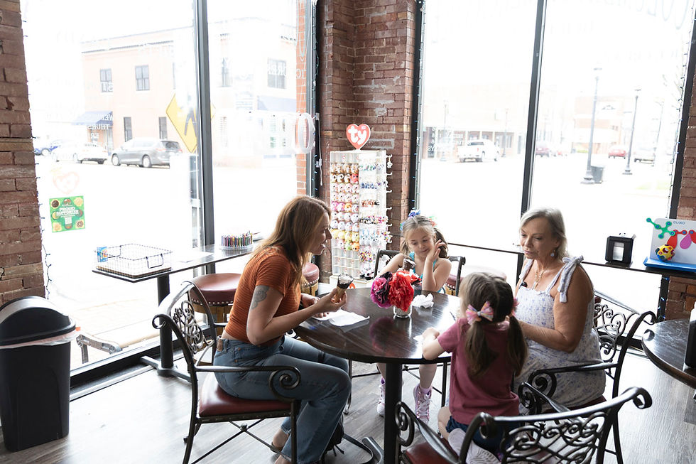 Bevery Brown of Unstoppable Bev with children at  Columbia Street Mercantile, specializes in ice Cream, special soda pop, and nostalgic candy in Farmington, MO. #573Magazine #FarmingtonCountryDays