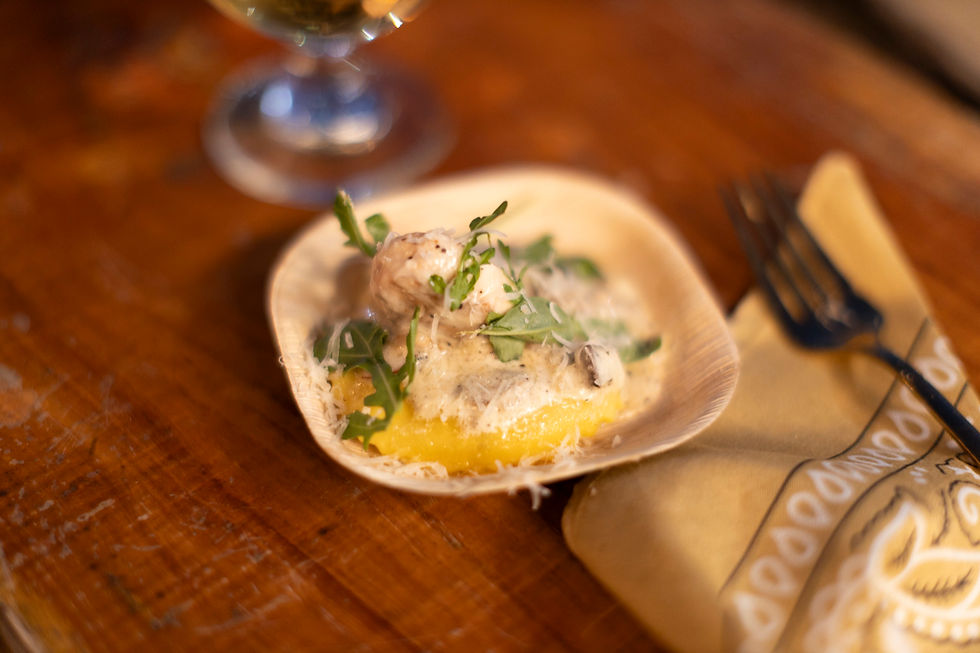 Wild mushroom raviolo in a brown butter sauce with crispy sage, finished with creamy Parmesan white sauce and smoked mushroom jus.