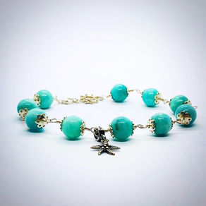 PULSEIRA CONTAS DE TURQUESA EM PRATA 950. 