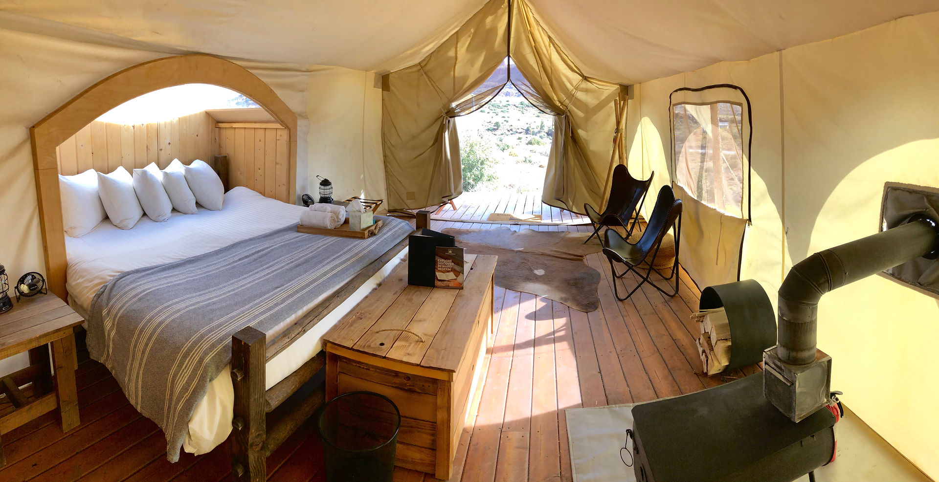 Interior of tent showing bed at Under Canvas - Zion