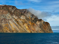 golden and red stone cliff