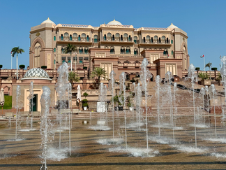 fountain plumes in front of a hotel