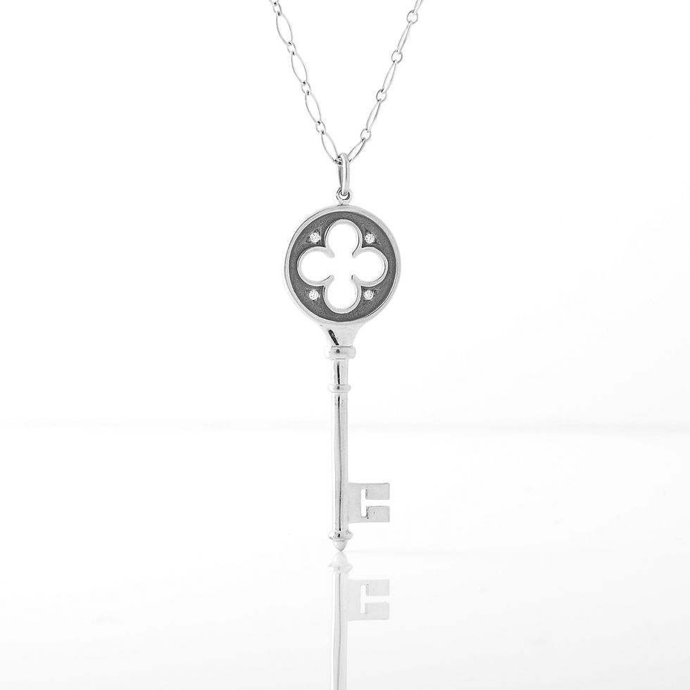 Thumbnail: Tiffany & Co. Clover Large Skeleton Key Pendant 18K White Gold & Diamond