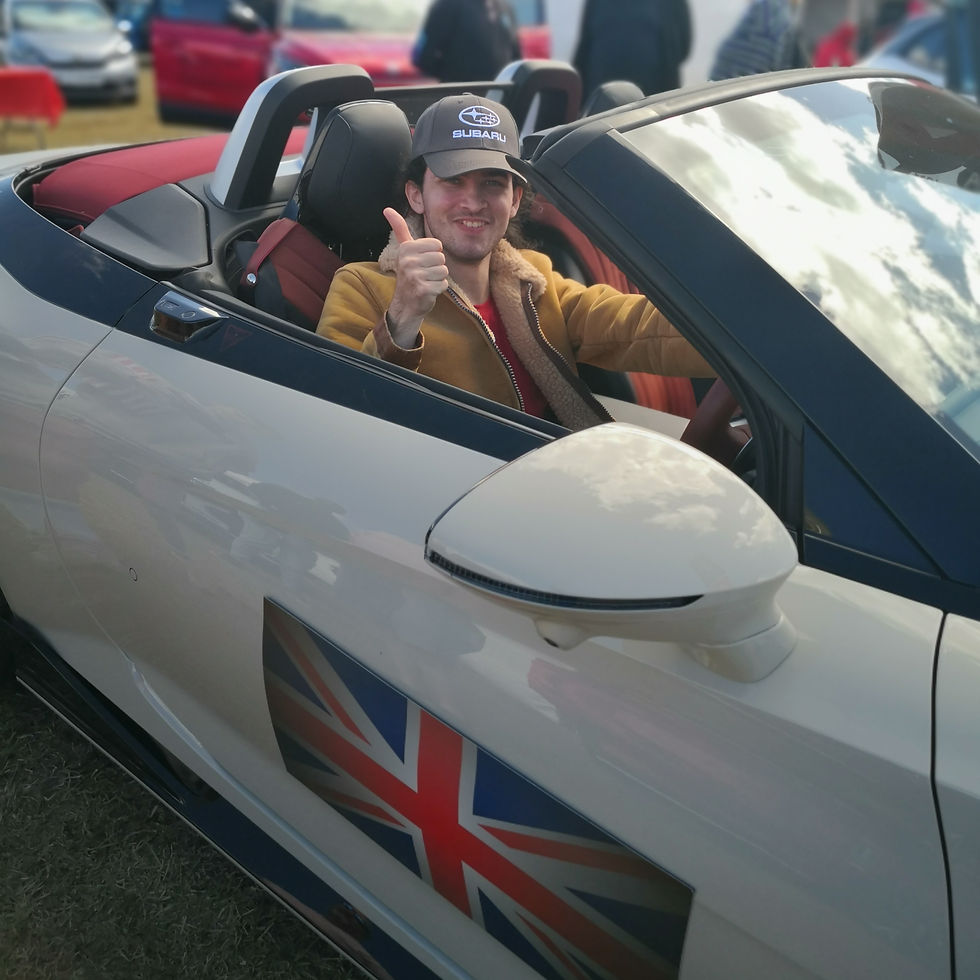 Dylan checking out the MG Cyberster EV