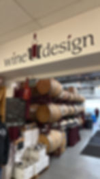 Wine barrels stacked inside wine U design establishment.