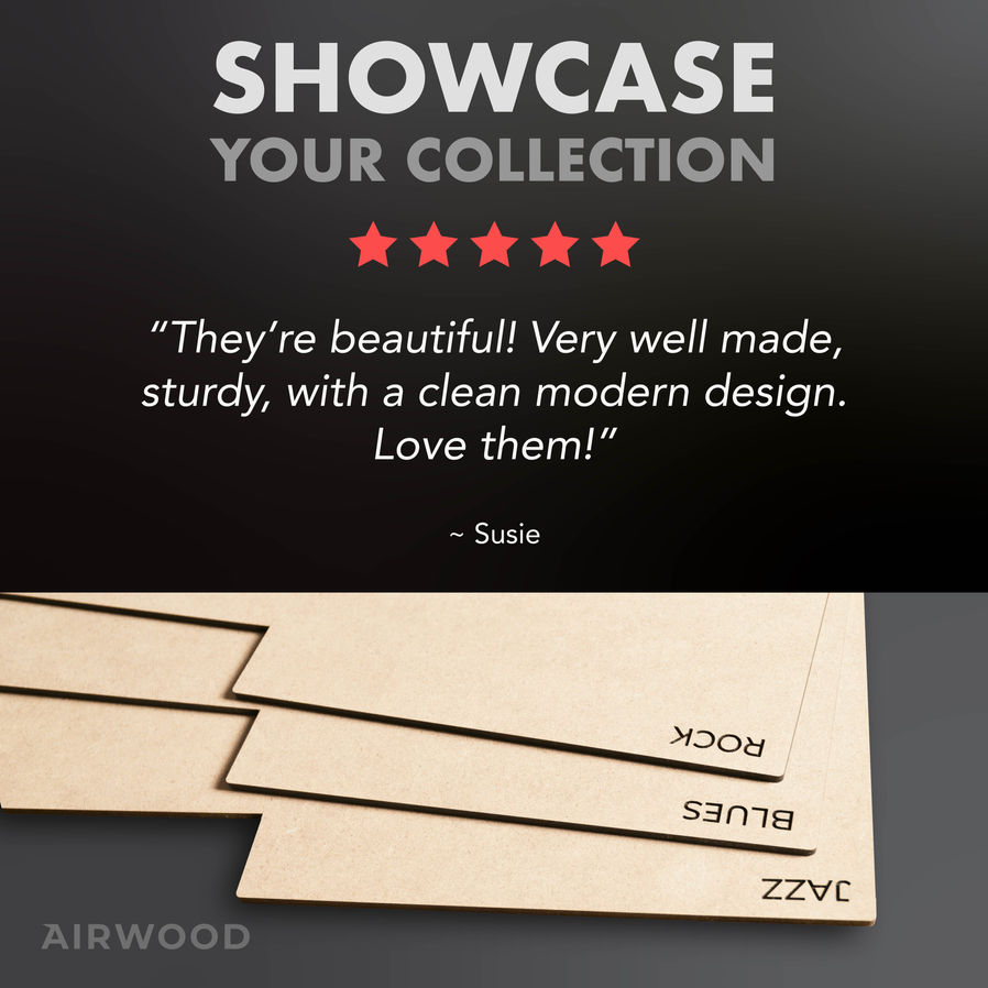 closeup of 10-inch vinyl record dividers detailing the dark consistent engraving of custom titles with an infographic illustr