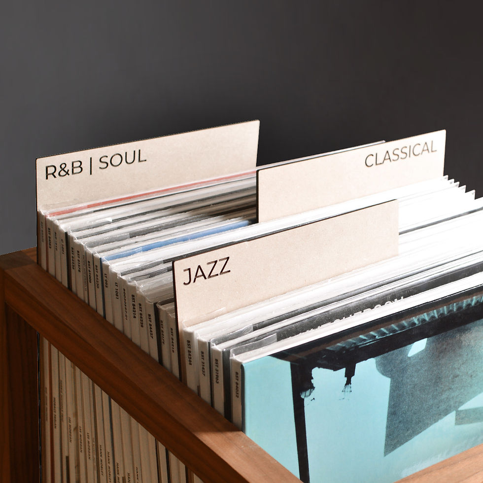 vinyl record dividers with laser-engraved custom titles separating records inside a minimal solid walnut record crate