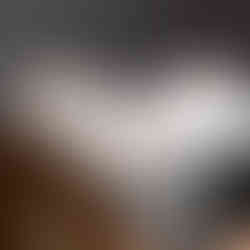 vinyl record dividers with laser-engraved custom alphabetical titles separating records inside a minimal solid walnut record