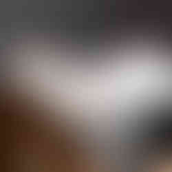 vinyl record dividers with laser-engraved custom alphabetical titles separating records inside a minimal solid walnut record