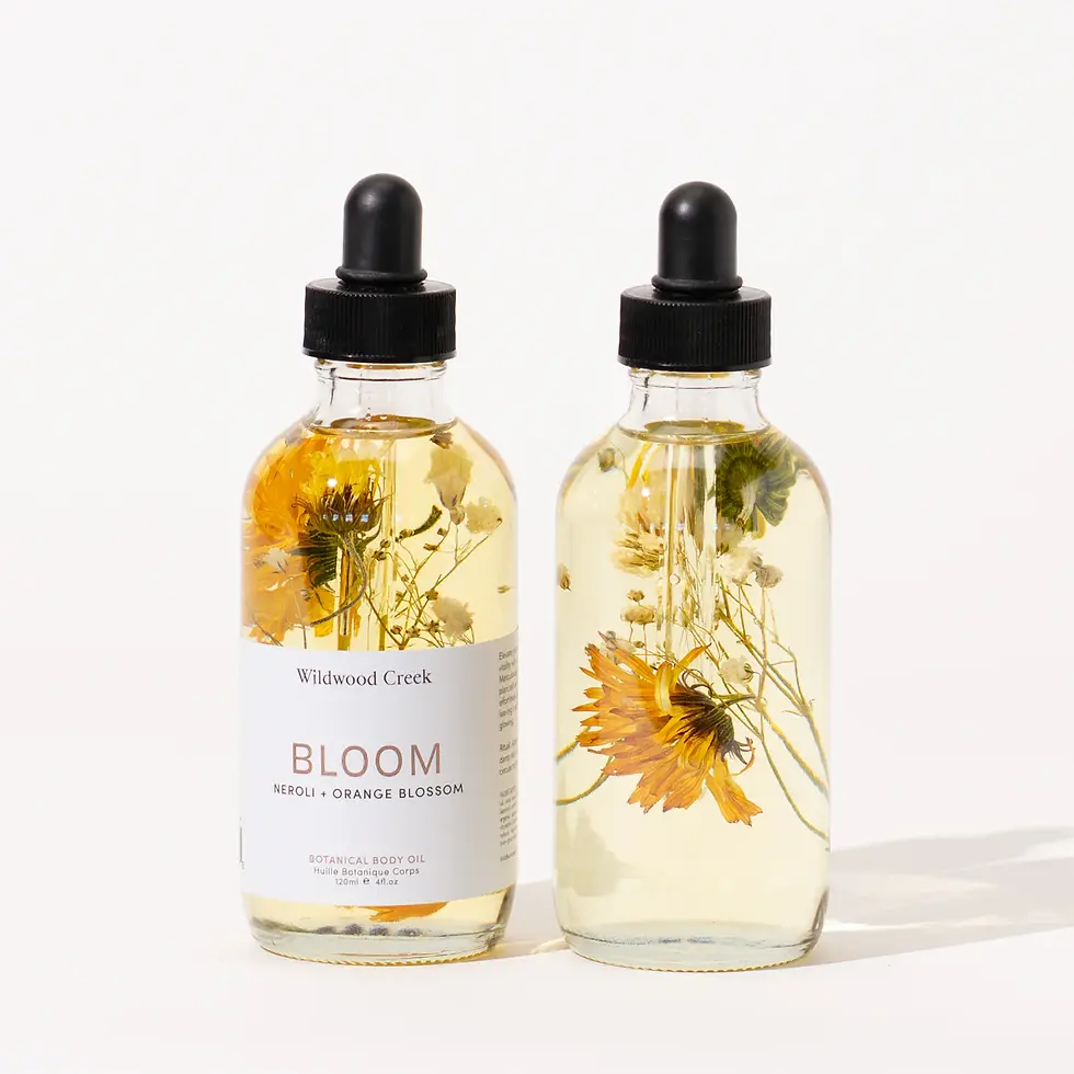 Wildwood Creek Bloom Body Oil 4 oz bottle with organic botanical oils, radiant floral scent, for silky glowing skin.