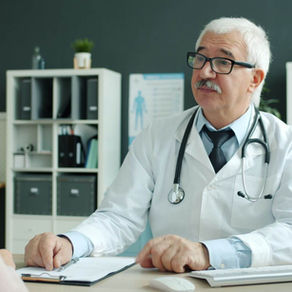Adult discussing longevity-focused care with a healthcare professional