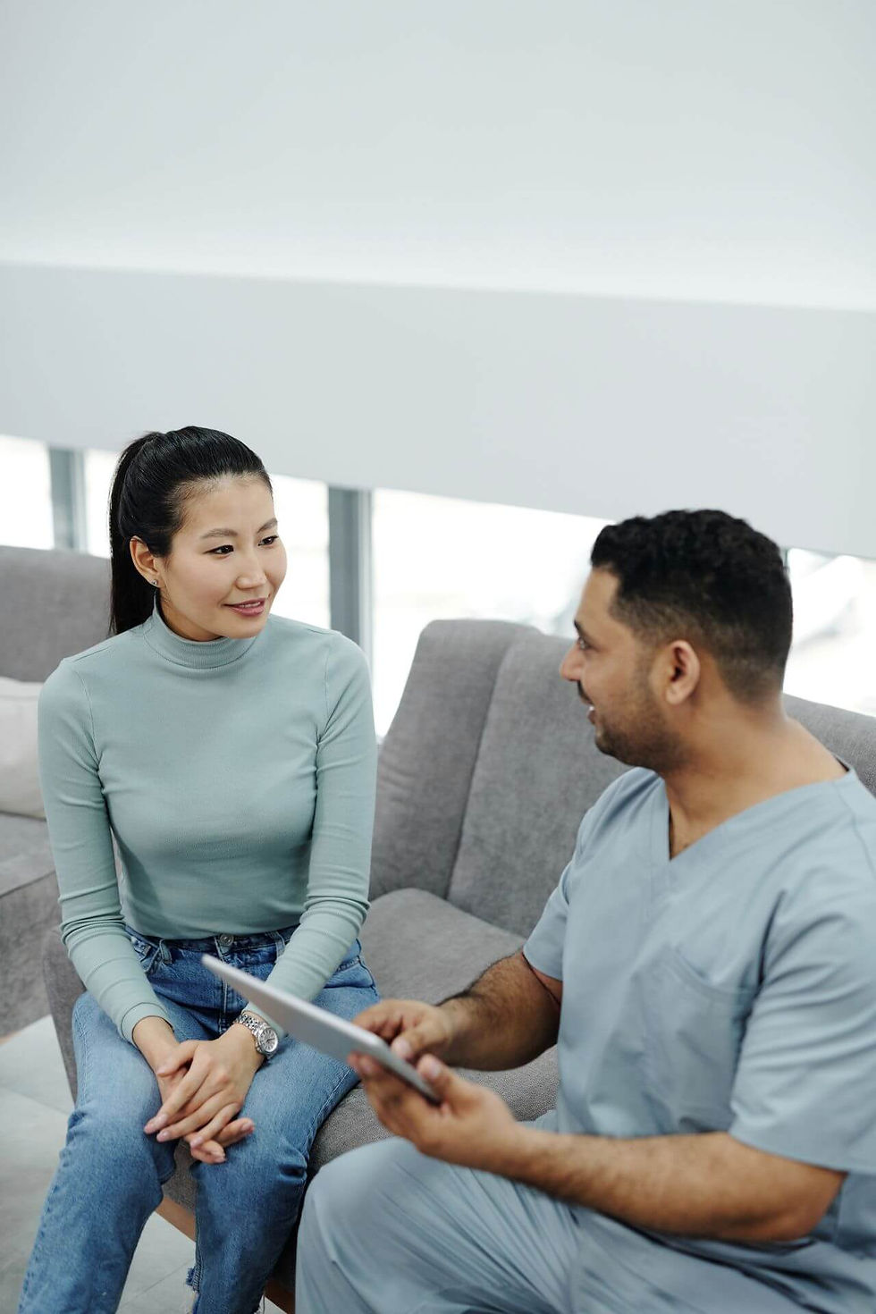 Patient speaking with a healthcare professional during a medical consultation