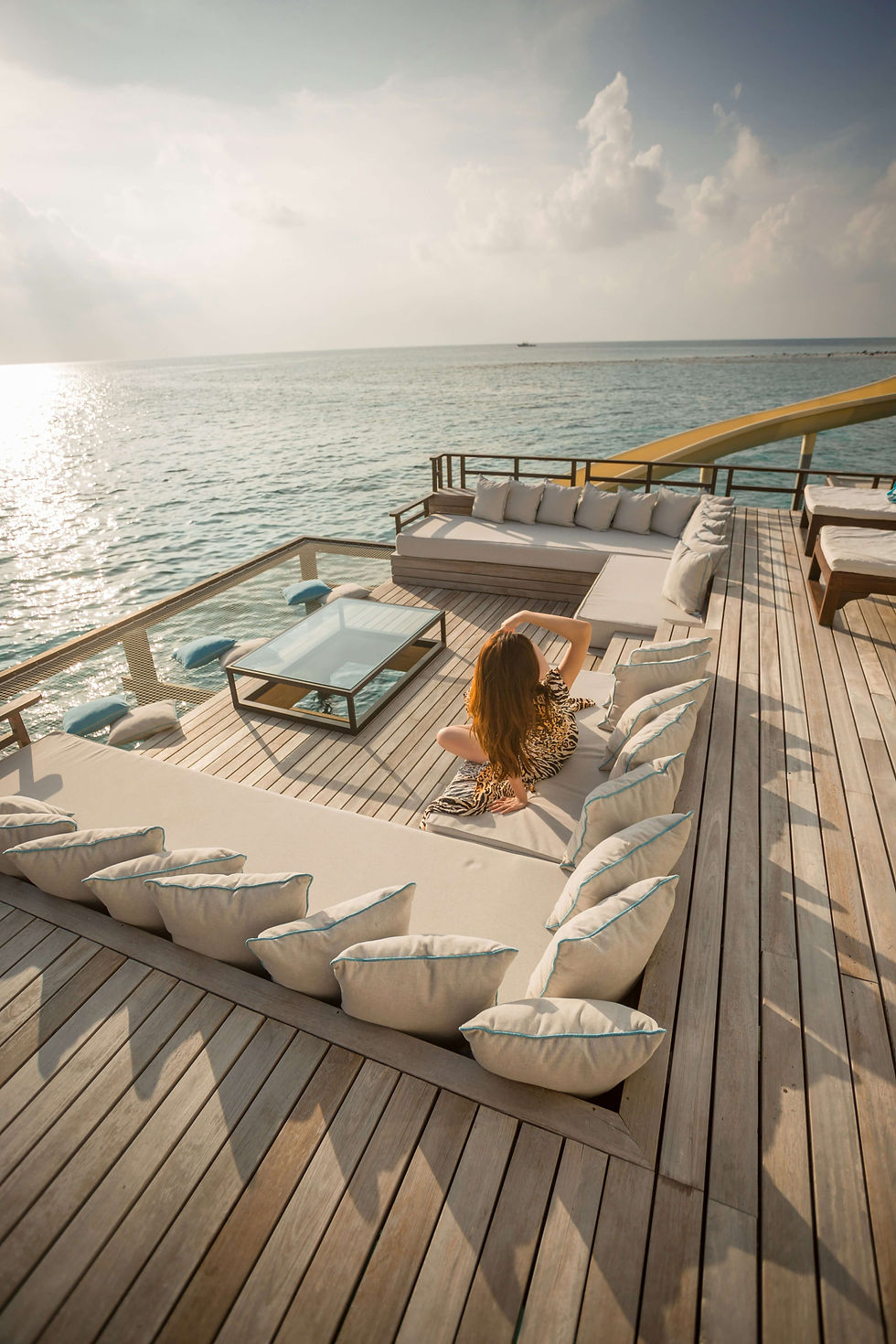 Ocean therapy in action: A woman experiencing the stress-relieving benefits of a day on the water.