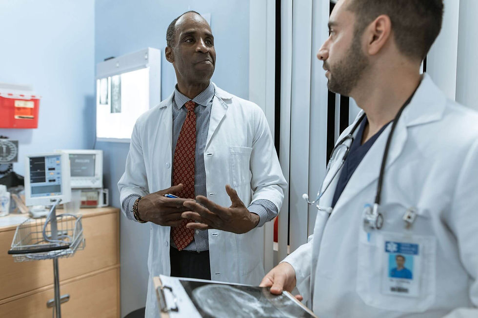 Healthcare professional holding a clipboard while preparing for a musculoskeletal and orthopaedic assessment.