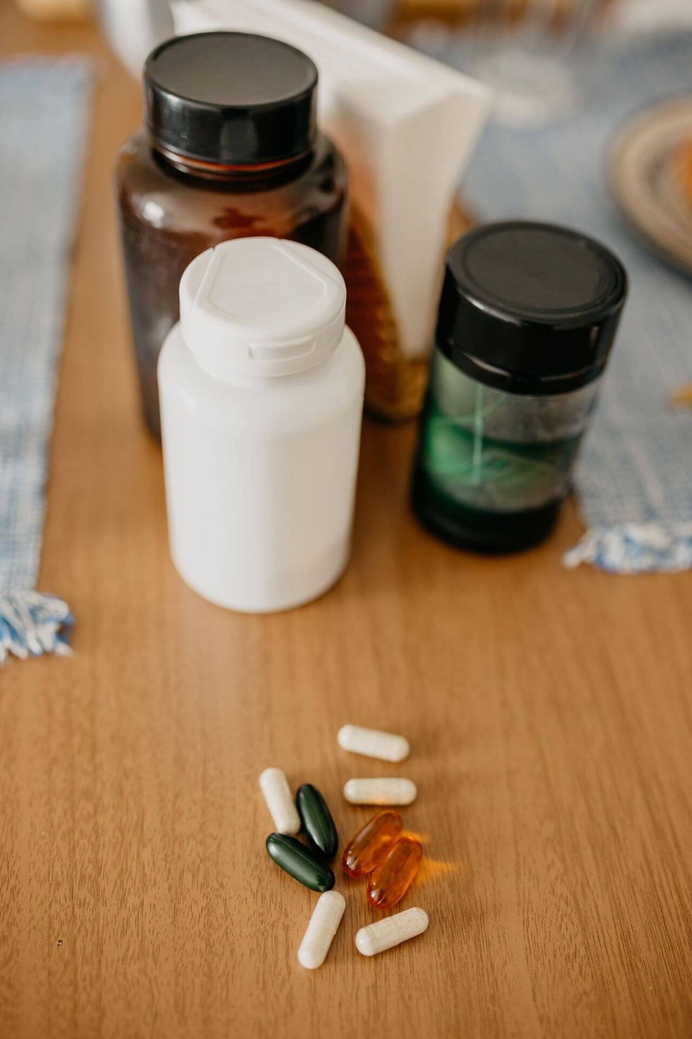 Assorted supplement bottles and capsules ready for a label-by-label comparison