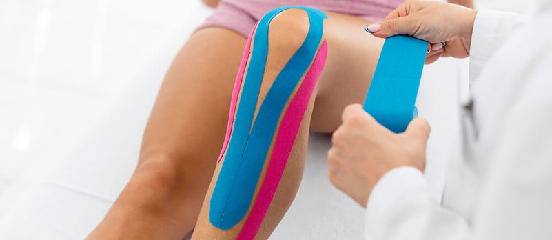 sports taping on left knee