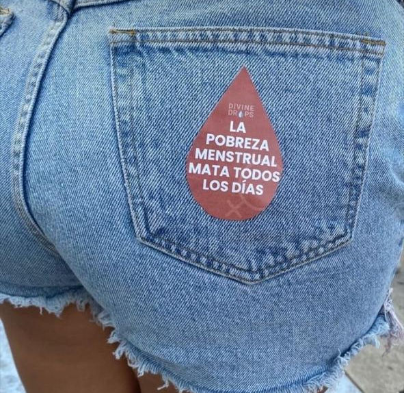 Participants proudly wore the stickers on the backs of their clothing, where they resembled a period stain—transforming shame into visibility, and stigma into solidarity. What is often hidden or silenced became a symbol of power, resistance, and pride.