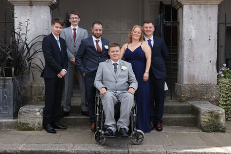 family outside rye town hall after wedding