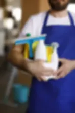 professional-cleaning-service-person-holding-supplies