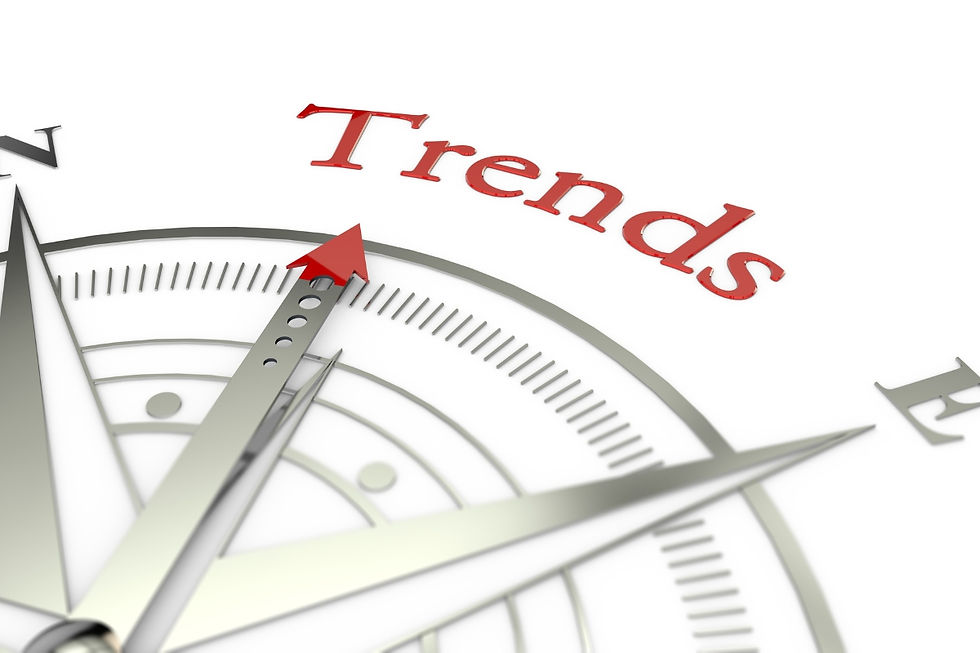 A compass pointing to the word trends on a white background
