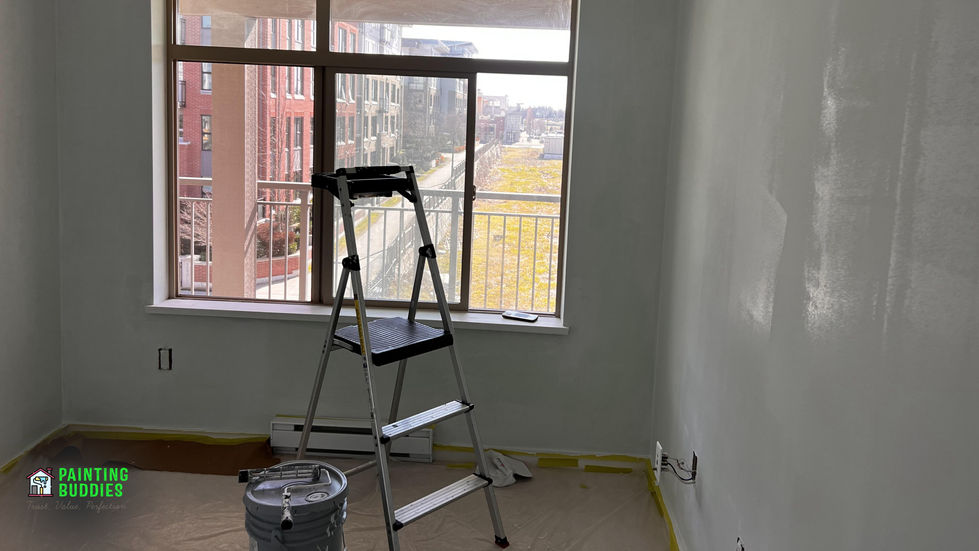 Ladder and paint bucket for painting a new coat of paint on walls.