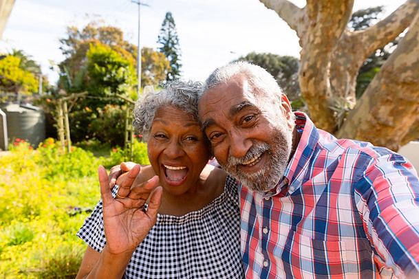 happy-african-american-senior-couple-taking-selfie-2022-01-19-00-02-51-utc.jpg