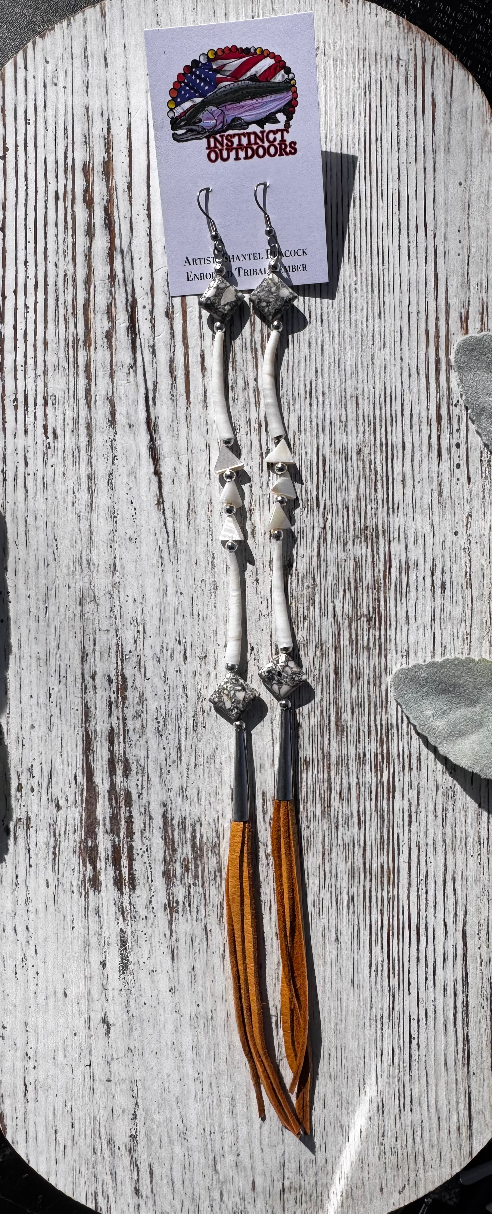 Dentalium and triangle shell dangles: A 