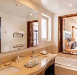 Luxury hotel suite with private balcony and breathtaking ocean views