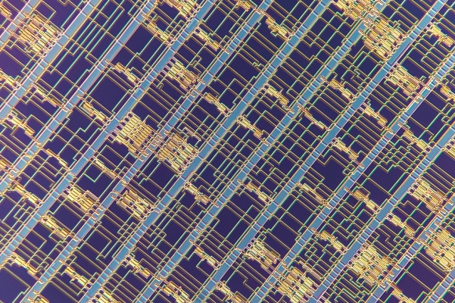 A microscopic image of a modern microprocessor built from carbon nanotube field-effect transistors. Image: Felice Frankel