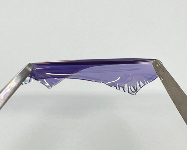 A photograph showing the flexible solar cell being stretched by two tweezers. © Reproduced from Ref. 1 and licensed under CC BY 4.0The webpage will open in a new tab. © 2024 J. Wang et al.