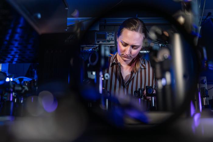 PhD candidate Nele Tornow in a laboratory for non-linear optics at the Institute of Solid State Physics at the University of Jena. Credit: Nicole Nerger