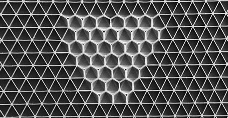 A drop of liquid applied to the center of a stiff triangular lattice softens and zips together the walls to transform the material into a hexagonal lattice. Image courtesy of Joanna Aizenberg, Harvard University