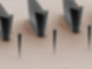 Trumpet-shaped nanowires with a length of about 10 micrometers are coupled to quantum dots located at their bases. The movement of the nanowire can be detected with a sensitivity of 100 femtometers by changing the wavelength of the light emitted by the quantum dots. The arrows are important for fabrication and help to locate the nanowires. @ Grenoble Alps University