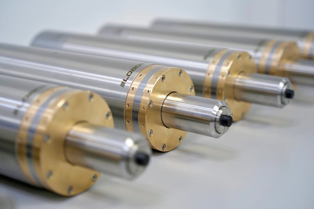 Lens Turning Spindles