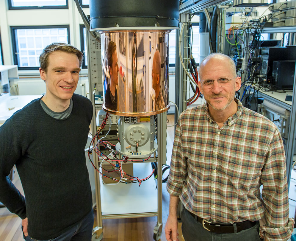 PhD Candidate Sven Albrecht and Professor Charles Marcus, Center for Quantum Devices (QDev) at the Niels Bohr Institute in Copenhagen. More than 80 researchers, graduate students and technicians work here at the research center in a huge building where top laboratories with advanced instruments for experiments have been built over two entire floors. (Credit: Ola Jakup Joensen, NBI)