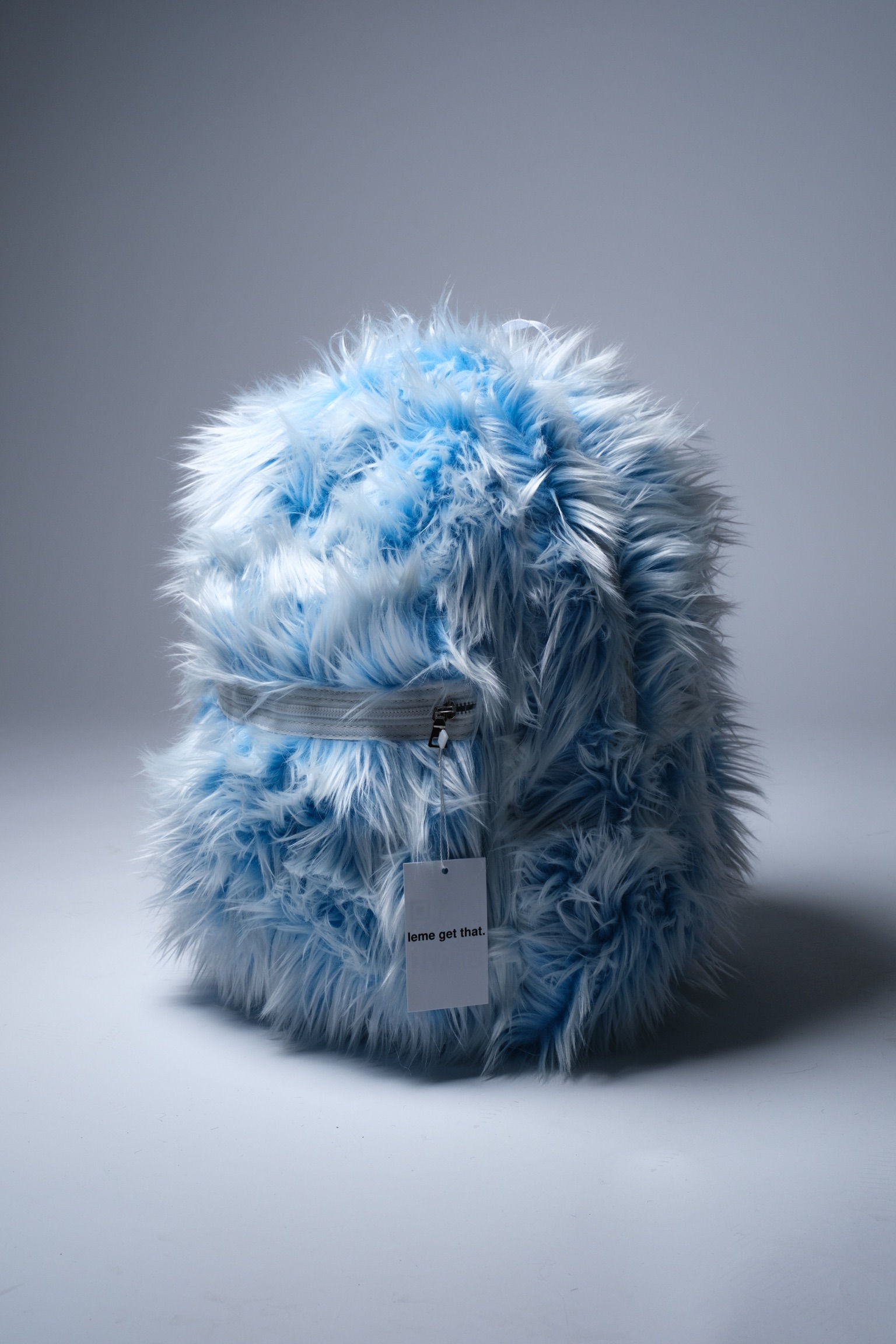 Blue/white fur backpack front view product shot