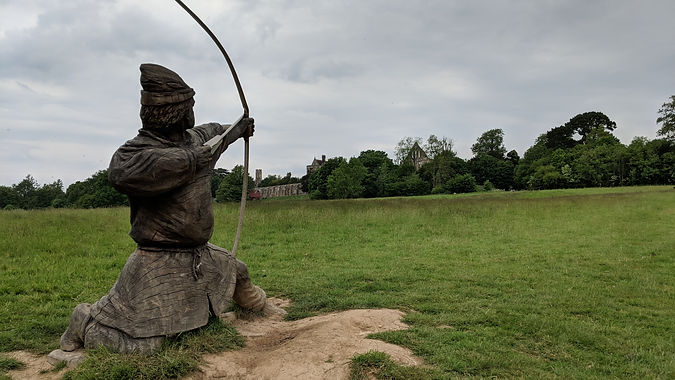 Holzfigur eines Bogenschützen