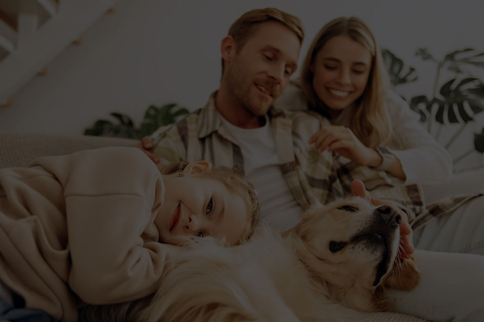 Smiling beautiful family, young mother, father and little daughter relaxing together, woma