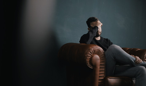 Thinking Man on Couch