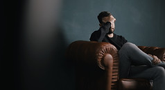 Thinking Man on Couch